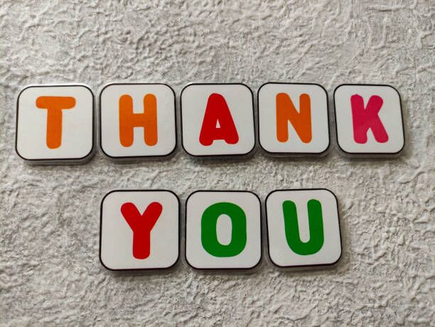 magnetic alphabet Colorful magnetic plastics with text THANK YOU on gray textured background. Selective focus image Thank you for reading stock pictures, royalty-free photos & images