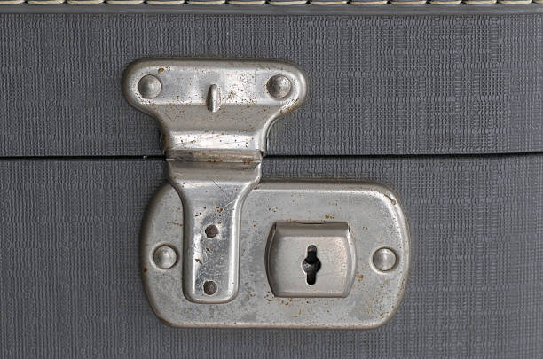 Old Suitcase Lock Metal lock on an old suitcase Gun safes movers stock pictures, royalty-free photos & images