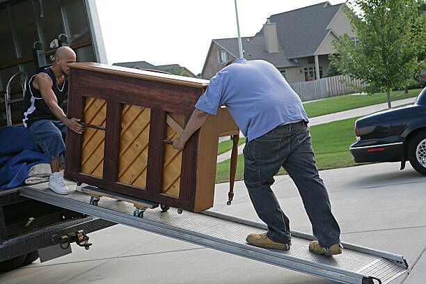 Piano Moving piano movers stock pictures, royalty-free photos & images