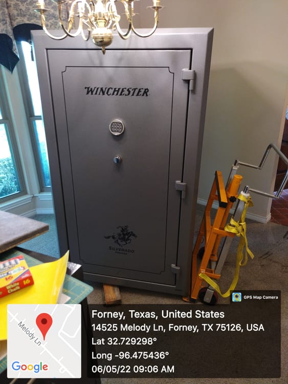 Gun safe movers in Bedford, TX moving a gun safe — Moving Company Guys