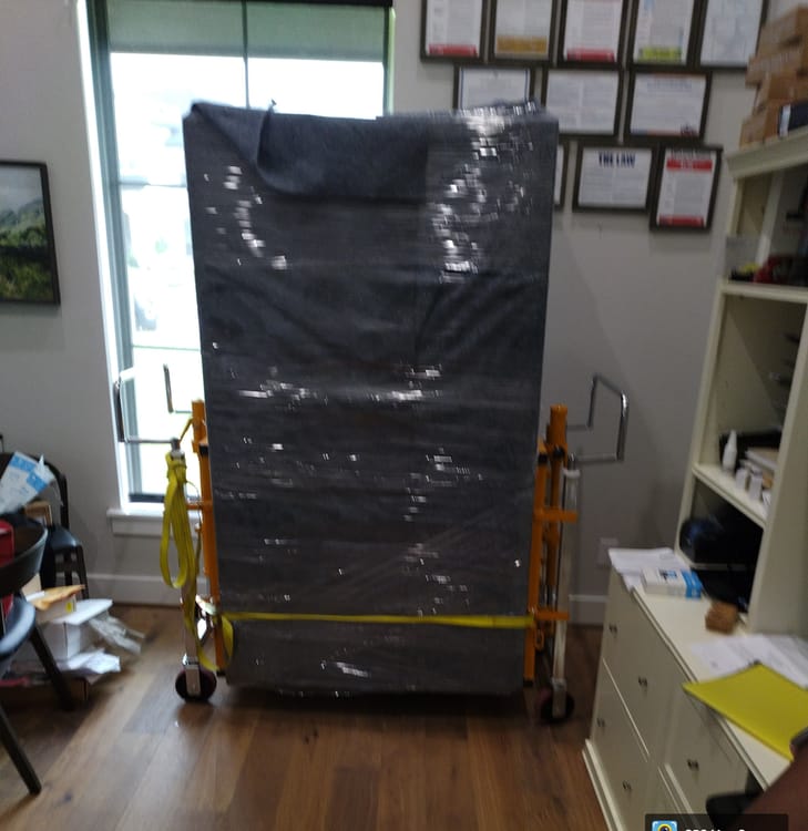 Gun safe movers in Celina, TX moving a gun safe — Moving Company Guys