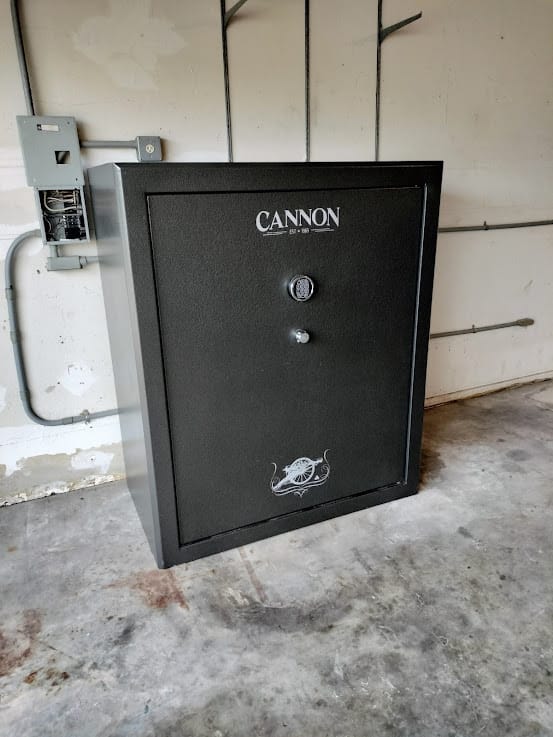 Gun safe movers in Grand Prairie, TX moving a gun safe — Moving Company Guys