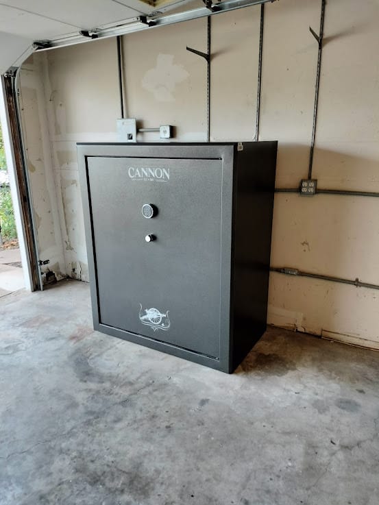Gun safe movers in Highland Village, TX moving a gun safe — Moving Company Guys