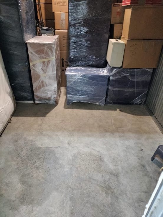 Gun safe movers in Hurst, TX moving a gun safe — Moving Company Guys