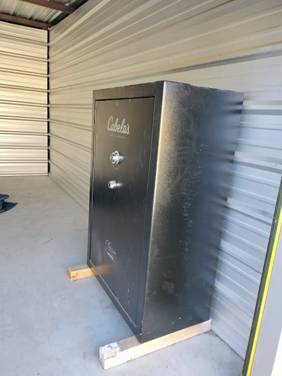 Gun safe movers in Irving, TX moving a gun safe — Moving Company Guys