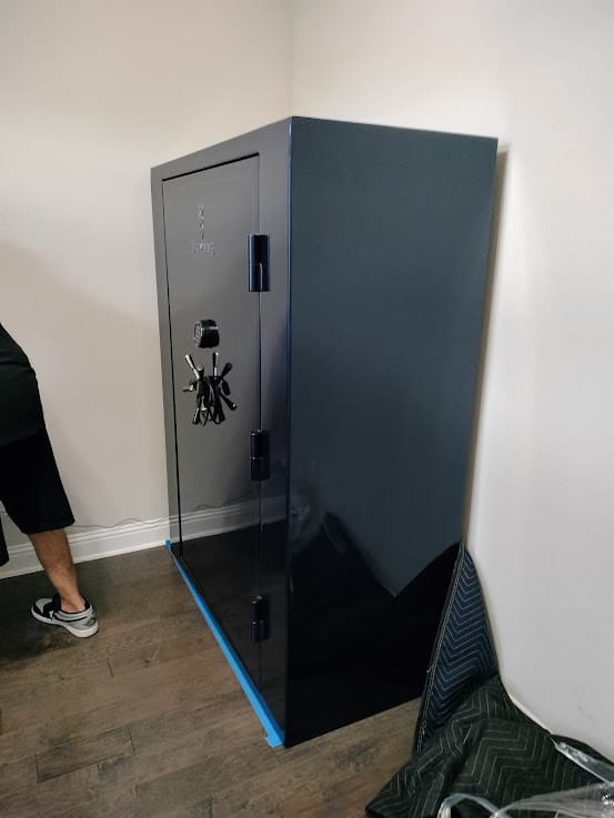Gun safe movers in Lancaster, TX moving a gun safe — Moving Company Guys