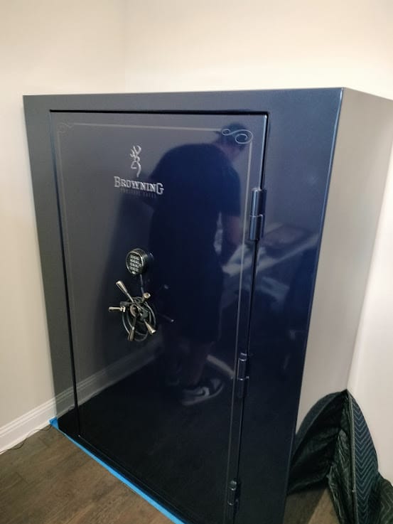 Gun safe movers in Lewisville, TX moving a gun safe — Moving Company Guys