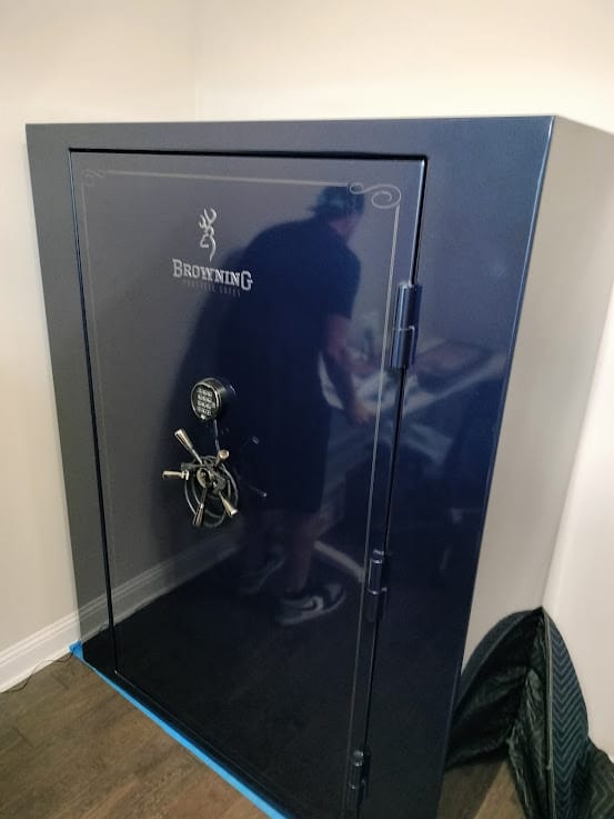 Gun safe movers in Little Elm, TX moving a gun safe — Moving Company Guys