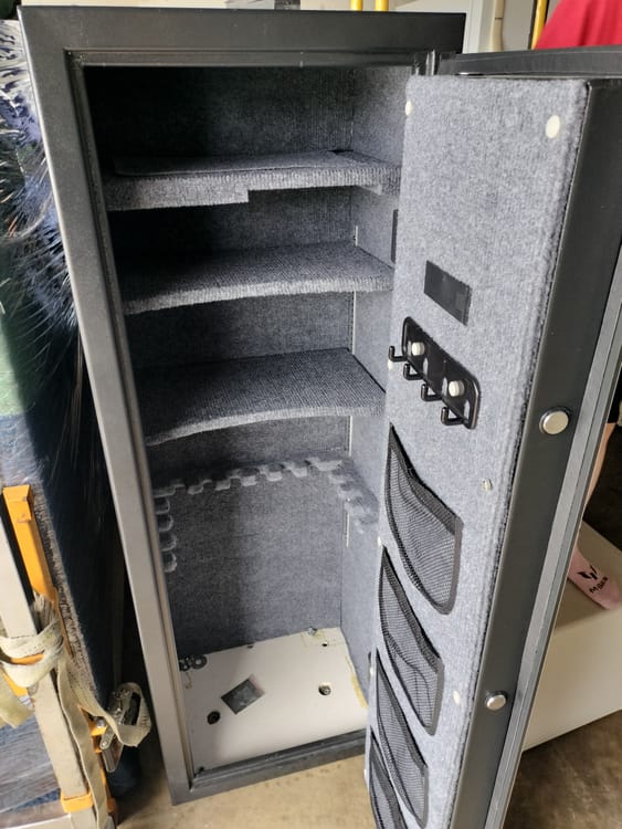 Gun safe movers in Melissa, TX moving a gun safe — Moving Company Guys