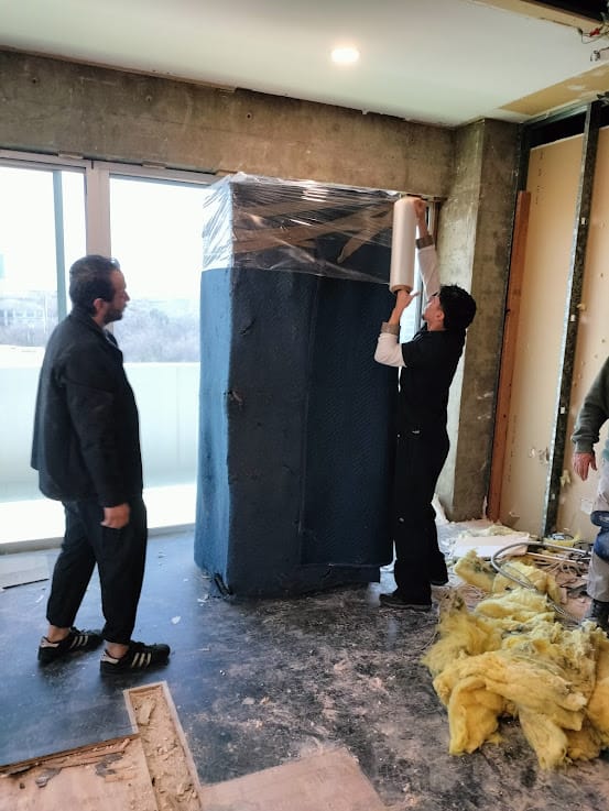 Gun safe movers in Red Oak, TX moving a gun safe — Moving Company Guys