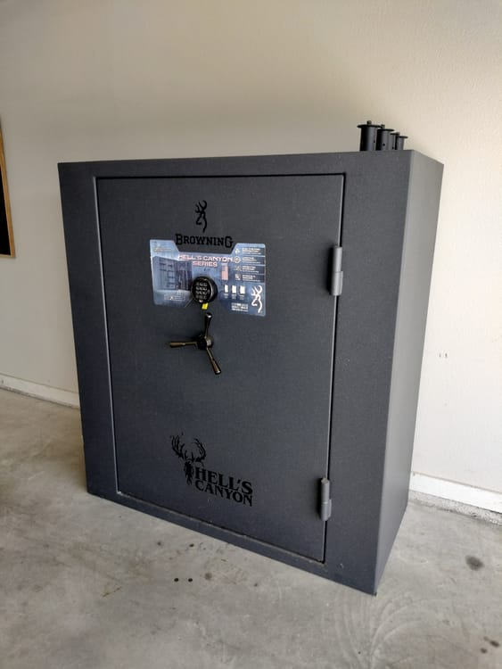 Gun safe movers in Rockwall, TX moving a gun safe — Moving Company Guys