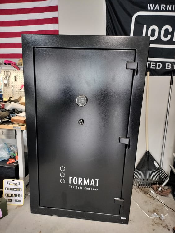 Gun safe movers in Royse City, TX moving a gun safe — Moving Company Guys