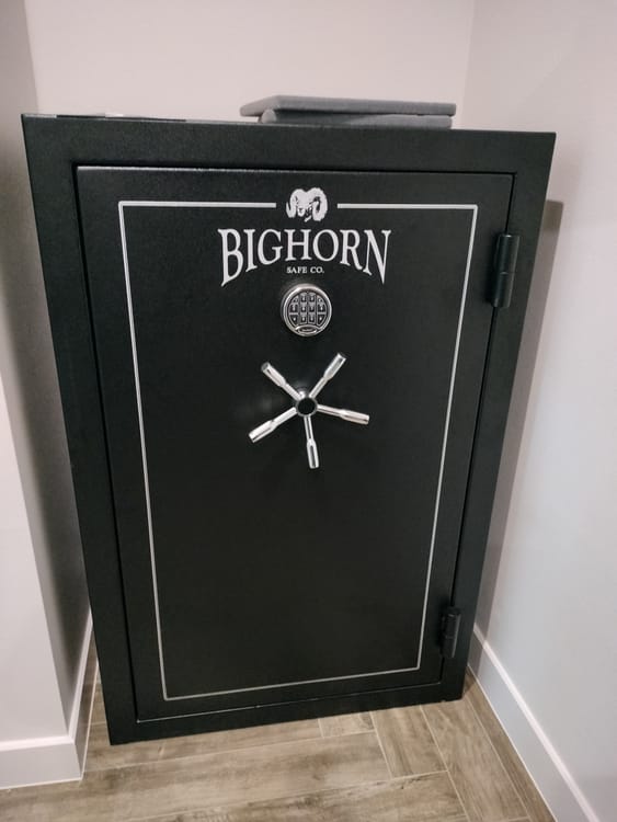 Gun safe movers in Southlake, TX moving a gun safe — Moving Company Guys