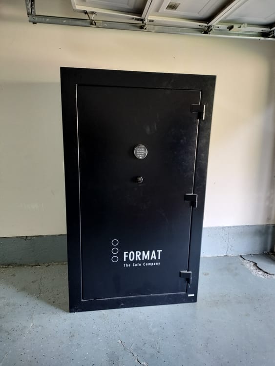 Gun safe movers in Terrell, TX moving a gun safe — Moving Company Guys
