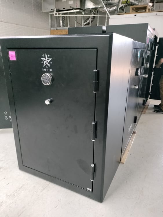 Gun safe movers in University Park, TX moving a gun safe — Moving Company Guys