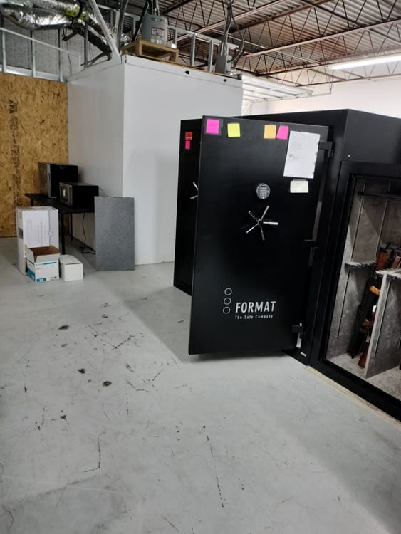 Gun safe movers in Wylie, TX moving a gun safe — Moving Company Guys